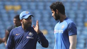 Indian captain Rohit Sharma, left, speaks with Shivam Dube(AP) Indian captain Rohit Sharma, left, speaks with Shivam Dube(AP)