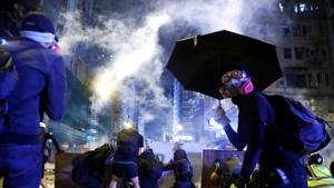 Violence at pro-democracy protests in Hong Kong that saw a police officer shoot a masked demonstrator and a man set on fire is “deeply disturbing”, the British government said Monday.(Reuters image) Violence at pro-democracy protests in Hong Kong that saw a police officer shoot a masked demonstrator and a man set on fire is “deeply disturbing”, the British government said Monday.(Reuters image)