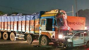 The collision was such that the car was crushed under the truck, a police officer said.(HT Photo) The collision was such that the car was crushed under the truck, a police officer said.(HT Photo)