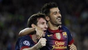 Barcelona's Lionel Messi (L) is congratulated by team mate David Villa after scoring his second goal against Spartak Moscow during their Champions League Group G soccer match at Nou Camp stadium in Barcelona (File Photo)(REUTERS) Barcelona's Lionel Messi (L) is congratulated by team mate David Villa after scoring his second goal against Spartak Moscow during their Champions League Group G soccer match at Nou Camp stadium in Barcelona (File Photo)(REUTERS)