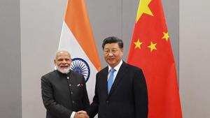 Prime Minister Narendra Modi shakes hands with Chinese President Xi Jinping during a meeting on the sidelines of BRICS Summit, in Brasilia, Brazil on Wednesday, November 13.(Photo: PTI) Prime Minister Narendra Modi shakes hands with Chinese President Xi Jinping during a meeting on the sidelines of BRICS Summit, in Brasilia, Brazil on Wednesday, November 13.(Photo: PTI)