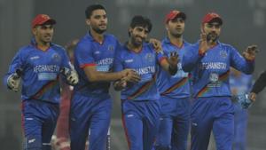 Karim Janat (centre) is being congratulated by team mates after he took five wickets in the second T20 match against West Indies in Lucknow on Saturday.(Deepak Gupta/HT Photo) Karim Janat (centre) is being congratulated by team mates after he took five wickets in the second T20 match against West Indies in Lucknow on Saturday.(Deepak Gupta/HT Photo)
