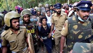 Bindu Ammini, 42, and Kanaka Durga, 44, are escorted by police after they attempted to enter the Sabarimala temple in Pathanamthitta in Kerala on December 24, 2018. Picture taken on December 24, 2018.(Reuters) Bindu Ammini, 42, and Kanaka Durga, 44, are escorted by police after they attempted to enter the Sabarimala temple in Pathanamthitta in Kerala on December 24, 2018. Picture taken on December 24, 2018.(Reuters)