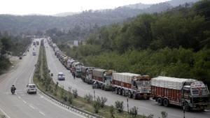 Trucks stranded at Jammu-Srinagar National Highway following a landslide in Ramban district.(HT Photo) Trucks stranded at Jammu-Srinagar National Highway following a landslide in Ramban district.(HT Photo)