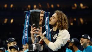 Greece's Stefanos Tsitsipas celebrates winning the ATP Finals with the trophy.(REUTERS) Greece's Stefanos Tsitsipas celebrates winning the ATP Finals with the trophy.(REUTERS)