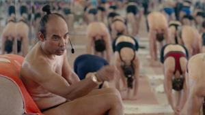 Bikram Yogi, Guru, Predator movie review: Bikram instructs his students.(Netflix) Bikram Yogi, Guru, Predator movie review: Bikram instructs his students.(Netflix)