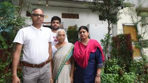 Pankaj Bhatnagar, president of Parda Bagh RWA, with his family. He has been struggling to get residents ownership rights.(Amal KS/HT PHOTO) Pankaj Bhatnagar, president of Parda Bagh RWA, with his family. He has been struggling to get residents ownership rights.(Amal KS/HT PHOTO)