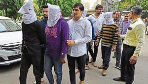 The four robbers in police custody.(Sanchit Khanna / HT Photo) The four robbers in police custody.(Sanchit Khanna / HT Photo)