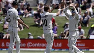 New Zealand's Neil Wagner, centre, is congratulated by teammates after dismissing England's Jos Buttler(AP) New Zealand's Neil Wagner, centre, is congratulated by teammates after dismissing England's Jos Buttler(AP)