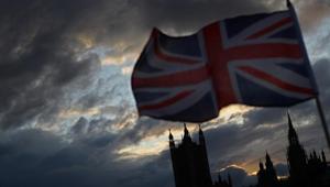 A Union Jack flag flutters in front of the Houses of Parliament in London, Britain.(Photo: Reuters)