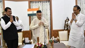 Devendra Fadnavis and Ajit Pawar with Maharashtra Governor Bhagat Singh Koshyari at the oath-taking ceremony at the Raj Bhawan inMumbai on Saturday.(Santosh Harhare/HT Photo) Devendra Fadnavis and Ajit Pawar with Maharashtra Governor Bhagat Singh Koshyari at the oath-taking ceremony at the Raj Bhawan inMumbai on Saturday.(Santosh Harhare/HT Photo)