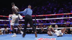 Deontay Wilder walks away after knocking down Luis Ortiz in a heavyweight title boxing match.(AP) Deontay Wilder walks away after knocking down Luis Ortiz in a heavyweight title boxing match.(AP)
