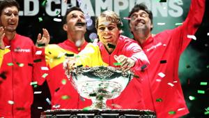 Rafael Nadal celebrates with the trophy and team mates after winning the Davis Cup.(REUTERS) Rafael Nadal celebrates with the trophy and team mates after winning the Davis Cup.(REUTERS)