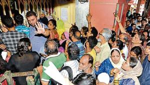People queue up for a Digital Ration Card form in Kolkata. The West Bengal government began digitising ration cards in September.(Samir Jana/HT Archive) People queue up for a Digital Ration Card form in Kolkata. The West Bengal government began digitising ration cards in September.(Samir Jana/HT Archive)