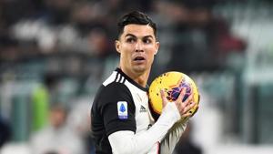 Juventus' Cristiano Ronaldo holds the ball.(REUTERS) Juventus' Cristiano Ronaldo holds the ball.(REUTERS)