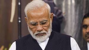 New Delhi: Prime Minister Narendra Modi reads a released publication during the function to commemorate 'Samvidhan Divas' at Parliament House, in New Delhi, Nov. 26, 2019. (PTI Photo/Shahbaz Khan) (PTI11_26_2019_000089B)(PTI) New Delhi: Prime Minister Narendra Modi reads a released publication during the function to commemorate 'Samvidhan Divas' at Parliament House, in New Delhi, Nov. 26, 2019. (PTI Photo/Shahbaz Khan) (PTI11_26_2019_000089B)(PTI)