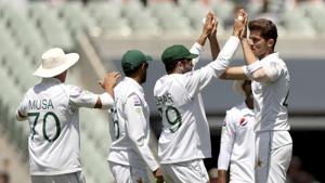 Pakistan fielders celebrate the fall of a wicket during Day-Night Test in Adelaide.(AP) Pakistan fielders celebrate the fall of a wicket during Day-Night Test in Adelaide.(AP)