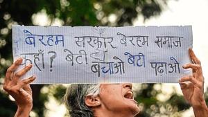 People shout slogans and hold placards during a protest in Mumbai against the gang rape and murder of a veterinarian on the outskirts of Hyderabad, Monday, December 2, 2019.(Ragul Krishnan / HT Photo) People shout slogans and hold placards during a protest in Mumbai against the gang rape and murder of a veterinarian on the outskirts of Hyderabad, Monday, December 2, 2019.(Ragul Krishnan / HT Photo)