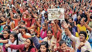 People shout slogans during a protest against the alleged rape and murder of a 27-year-old woman in Hyderabad.(Reuters) People shout slogans during a protest against the alleged rape and murder of a 27-year-old woman in Hyderabad.(Reuters)