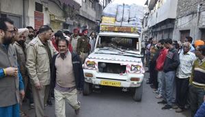 Locals and family members of the victim, Harshit Kaushal where the pick-up jeep crushed him to death near Gokul Road in old city area on Wednesday. After the incident, the driver of the jeep fled on foot, following which the locals vandalised the vehicle.(Harsimar Pal Singh/) Locals and family members of the victim, Harshit Kaushal where the pick-up jeep crushed him to death near Gokul Road in old city area on Wednesday. After the incident, the driver of the jeep fled on foot, following which the locals vandalised the vehicle.(Harsimar Pal Singh/)