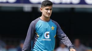 Pakistan's Naseem Shah prepares his bowling line markers.(AP) Pakistan's Naseem Shah prepares his bowling line markers.(AP)