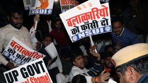 Protests against the burning of Unnao rape survivor outside UP Bhawan in New Delhi on Thursday, Dec 5, 2019.(ANI) Protests against the burning of Unnao rape survivor outside UP Bhawan in New Delhi on Thursday, Dec 5, 2019.(ANI)