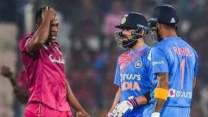 India's skipper Virat Kohli and West Indies bowler talk as batsman KL Rahul looks on.(PTI) India's skipper Virat Kohli and West Indies bowler talk as batsman KL Rahul looks on.(PTI)