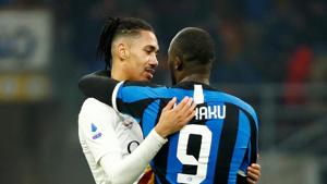 AS Roma's Chris Smalling with Inter Milan's Romelu Lukaku after the match.(REUTERS) AS Roma's Chris Smalling with Inter Milan's Romelu Lukaku after the match.(REUTERS)