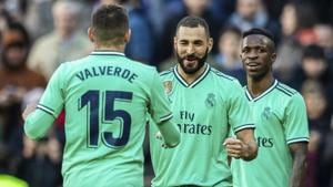 Real Madrid's Karim Benzema, center, celebrates after scoring.(AP) Real Madrid's Karim Benzema, center, celebrates after scoring.(AP)