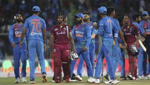 West Indies' Nicholas Pooran, third left, and Lendl Simmons, third right, shake hands with Indian players after their win in the second Twenty20 international.(AP) West Indies' Nicholas Pooran, third left, and Lendl Simmons, third right, shake hands with Indian players after their win in the second Twenty20 international.(AP)
