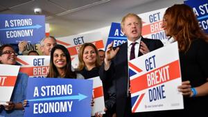 Britain's Prime Minister Boris Johnson speaks to activists and supporters as he poses for a photograph at the Conservative Campaign Headquarters Call Centre in central London(REUTERS) Britain's Prime Minister Boris Johnson speaks to activists and supporters as he poses for a photograph at the Conservative Campaign Headquarters Call Centre in central London(REUTERS)