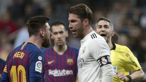 Lionel Messi and Sergio Ramos clash during an El Clasico match.(Getty Images) Lionel Messi and Sergio Ramos clash during an El Clasico match.(Getty Images)