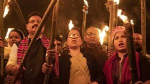 Activists participate in a torch light procession to protest against the Citizenship Amendment Bill (CAB) in Gauhati.(AP) Activists participate in a torch light procession to protest against the Citizenship Amendment Bill (CAB) in Gauhati.(AP)