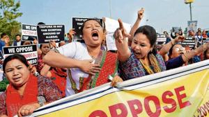People shout slogans, as they protest against the Citizenship Amendment Bill (CAB), during the shutdown called by North East Students’ Organization (NESO), in Agartala on Tuesday.(Photo: ANI) People shout slogans, as they protest against the Citizenship Amendment Bill (CAB), during the shutdown called by North East Students’ Organization (NESO), in Agartala on Tuesday.(Photo: ANI)