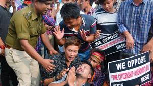 A man requesting police officer as he is being detained during a protest against the Citizenship Amendment Bill (CAB), in Agartala on Dec 11, 2019. (ANI Photo) A man requesting police officer as he is being detained during a protest against the Citizenship Amendment Bill (CAB), in Agartala on Dec 11, 2019. (ANI Photo)