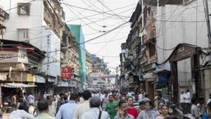 Pedestrians walk past stores in Zaveri Bazaar, Mumbai. ADB expects the growth to pick up to 6.5 per cent next year on supportive government policies.(Bloomberg) Pedestrians walk past stores in Zaveri Bazaar, Mumbai. ADB expects the growth to pick up to 6.5 per cent next year on supportive government policies.(Bloomberg)