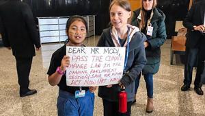 Madrid: Eight-year-old Licypriya Kangujam from Manipur with Greta Thunberg, the 16-year -old Swedish teenager known for her aggressive climate activism, at the Climate Summit in Madrid, Spain.(PTI) Madrid: Eight-year-old Licypriya Kangujam from Manipur with Greta Thunberg, the 16-year -old Swedish teenager known for her aggressive climate activism, at the Climate Summit in Madrid, Spain.(PTI)