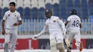Pakistani pacer Naseem Shah follows the ball while Sri Lankan batsmen Dhananjaya de Silva.(AP) Pakistani pacer Naseem Shah follows the ball while Sri Lankan batsmen Dhananjaya de Silva.(AP)