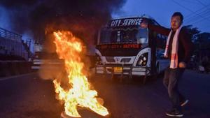 Protestors burn tyres during Assam Bandh stike called by All Assam Chutia Students' Union and All Moran Students Union against Citizenship (Amendment) Bill (CAB), in Guwahati.(PTI) Protestors burn tyres during Assam Bandh stike called by All Assam Chutia Students' Union and All Moran Students Union against Citizenship (Amendment) Bill (CAB), in Guwahati.(PTI)
