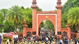 Aligarh: Police personnel stand guard outside Aligarh Muslim University (AMU) as students protest against the passing of Citizenship Amendment Bill, in Aligarh, Friday, Dec. 13, 2019. (PTI Photo)(PTI12_13_2019_000282B)(PTI) Aligarh: Police personnel stand guard outside Aligarh Muslim University (AMU) as students protest against the passing of Citizenship Amendment Bill, in Aligarh, Friday, Dec. 13, 2019. (PTI Photo)(PTI12_13_2019_000282B)(PTI)