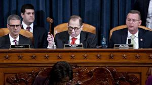 House Judiciary Committee Chairman Rep. Jerrold Nadler, D-N.Y., center, lowers his gavel signaling the adjournment following a marathon debate during a markup of the articles of impeachment against President Donald Trump, on Capitol Hill.(AP) House Judiciary Committee Chairman Rep. Jerrold Nadler, D-N.Y., center, lowers his gavel signaling the adjournment following a marathon debate during a markup of the articles of impeachment against President Donald Trump, on Capitol Hill.(AP)
