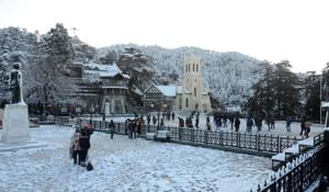 PICTURE PERFECT: The snow-covered Ridge in Shimla on Saturday morning. The Queen of the Hills received 8cm of snow overnight in the season’s first snowfall, drawing weekend tourists from across the region.(Deepak Sansta/HT) PICTURE PERFECT: The snow-covered Ridge in Shimla on Saturday morning. The Queen of the Hills received 8cm of snow overnight in the season’s first snowfall, drawing weekend tourists from across the region.(Deepak Sansta/HT)
