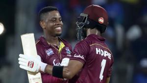 West Indies' Shimron Hetmyer, left, celebrates with batting partner Shai Hope after scoring a century(AP) West Indies' Shimron Hetmyer, left, celebrates with batting partner Shai Hope after scoring a century(AP)
