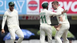 South Africa's captain Faf du Plessis, left, runs to celebrate with Anrich Nortje, right, the dismissal of India's captain Virat Kohli during the third and last cricket test match between India and South Africa.(AP) South Africa's captain Faf du Plessis, left, runs to celebrate with Anrich Nortje, right, the dismissal of India's captain Virat Kohli during the third and last cricket test match between India and South Africa.(AP)