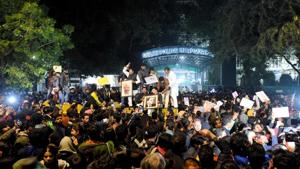 Students from Jawaharlal Nehru University (JNU) hold portraits of Mahatma Gandhi and BR Ambedkar and raise slogans to protest against the Delhi Police action on the students of Jamia Millia Islamia (JMI), and in solidarity with the students of JMI, outside Police Headquarters (PHQ), in New Delhi, India, on Sunday, December 15, 2019. (Photo by Amal KS / HT Photo) Students from Jawaharlal Nehru University (JNU) hold portraits of Mahatma Gandhi and BR Ambedkar and raise slogans to protest against the Delhi Police action on the students of Jamia Millia Islamia (JMI), and in solidarity with the students of JMI, outside Police Headquarters (PHQ), in New Delhi, India, on Sunday, December 15, 2019. (Photo by Amal KS / HT Photo)