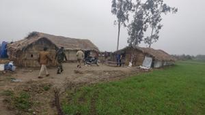 Police conducting searches in a village near the Indo-Pak border in Pathankot district on Wednesday.(HT Photo) Police conducting searches in a village near the Indo-Pak border in Pathankot district on Wednesday.(HT Photo)