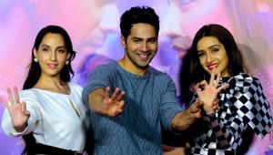 Nora Fatehi (L), Varun Dhawan (C) and Shraddha Kapoor (R) pose for photographs during the trailer launch of the upcoming Hindi dance film Street Dancer 3D in Mumbai on December 18, 2019. (Photo by Sujit Jaiswal / AFP)(AFP) Nora Fatehi (L), Varun Dhawan (C) and Shraddha Kapoor (R) pose for photographs during the trailer launch of the upcoming Hindi dance film Street Dancer 3D in Mumbai on December 18, 2019. (Photo by Sujit Jaiswal / AFP)(AFP)