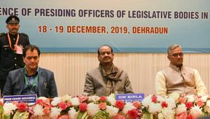 Lok Sabha speaker Om Birla with Uttarakhand Assembly Speaker Premchand Aggarwal and Chief Minister Trivendra Singh Rawat at the conference of presiding officers of legislative bodies, in Dehradun, on Wednesday.(PTI Photo) Lok Sabha speaker Om Birla with Uttarakhand Assembly Speaker Premchand Aggarwal and Chief Minister Trivendra Singh Rawat at the conference of presiding officers of legislative bodies, in Dehradun, on Wednesday.(PTI Photo)