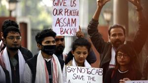 Assamese in Pune staged a protest at JM road against CAA and NRC Wednesday morning.(Rahul Raut/HT PHOTO) Assamese in Pune staged a protest at JM road against CAA and NRC Wednesday morning.(Rahul Raut/HT PHOTO)