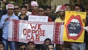 People from the Indian state of Assam holds a placard during a protest against the Citizenship (Amendment) Bill (CAB),at Azad Maidan in Mumbai on Saturday.(Kunal Patil/HT Photo) People from the Indian state of Assam holds a placard during a protest against the Citizenship (Amendment) Bill (CAB),at Azad Maidan in Mumbai on Saturday.(Kunal Patil/HT Photo)